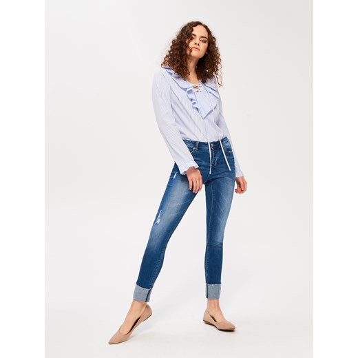 Sinsay - Przecierane jeansy slim fit - Niebieski