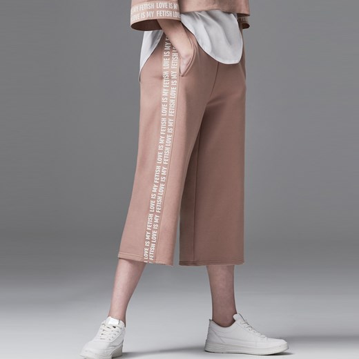 Reserved - Dresowe spodnie culotte - Kremowy fioletowy Reserved L Reserved.