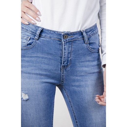 Jasne spodnie jeansowe przylegające niebieski  XS olika.com.pl