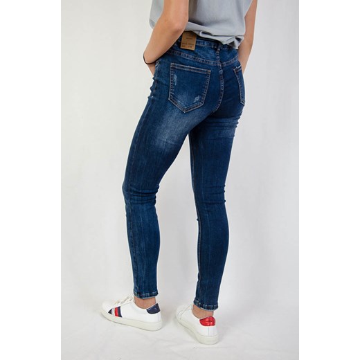 Ciemne spodnie jeansowe z delikatnymi przetarciami (L- 4 XL)   4XL olika.com.pl