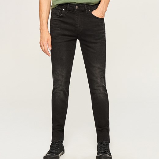 Reserved - Spodnie jeansowe slim fit z przetarciami - Czarny  Reserved 34 