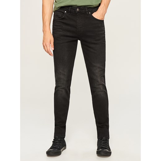 Reserved - Spodnie jeansowe slim fit z przetarciami - Czarny
