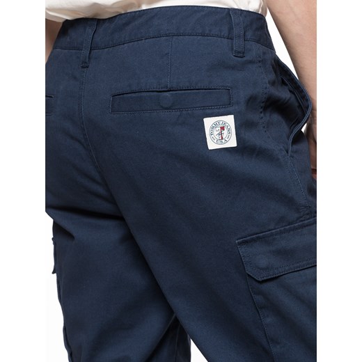 Niebieskie spodnie męskie Tommy Jeans 