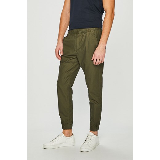 Zielone spodnie męskie Tommy Jeans 