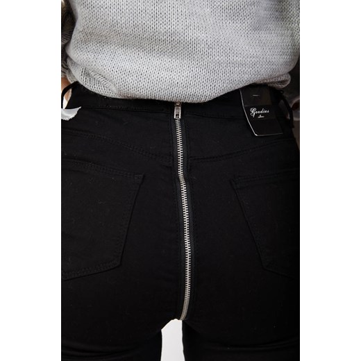 Czarne spodnie jeansowe z zamkiem z tyłu Olika  XL olika.com.pl