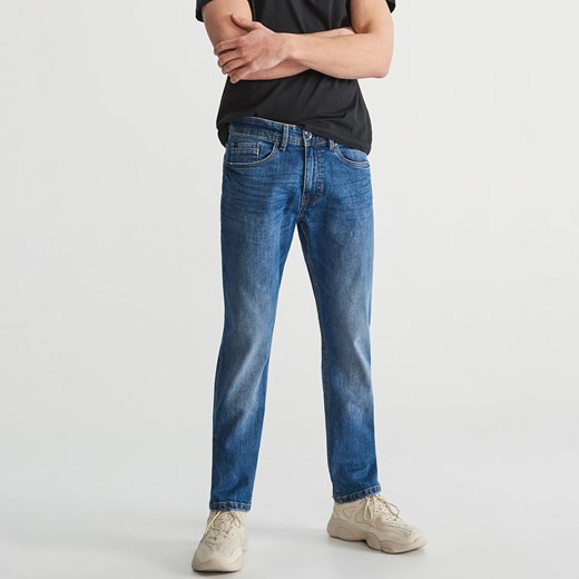 Niebieskie jeansy męskie Reserved 