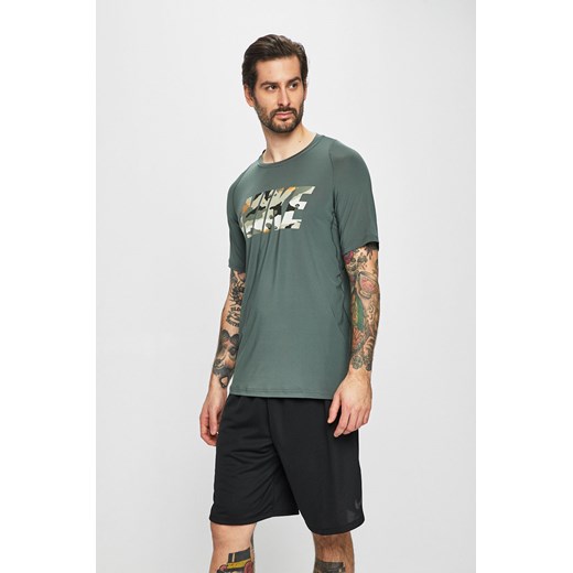 Koszulka sportowa Nike zielona z elastanu bez wzorów 
