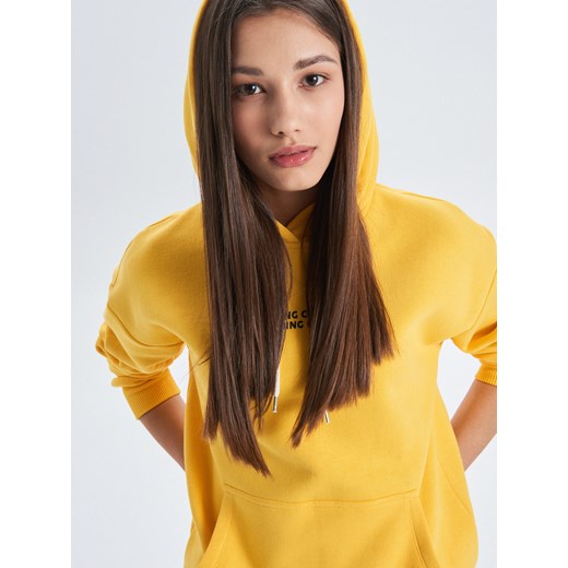 Bluza damska żółta Cropp bez wzorów 