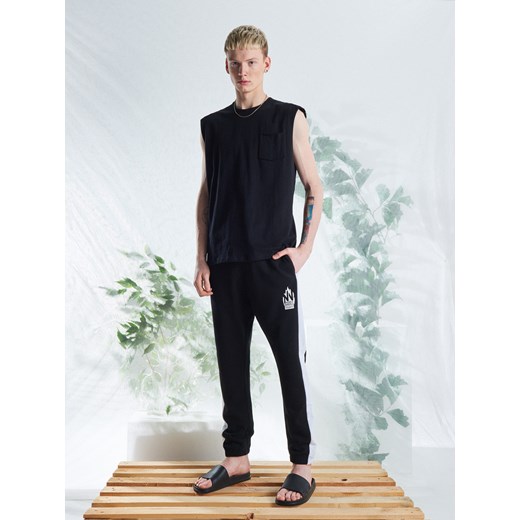 Spodnie męskie Cropp czarne gładkie 