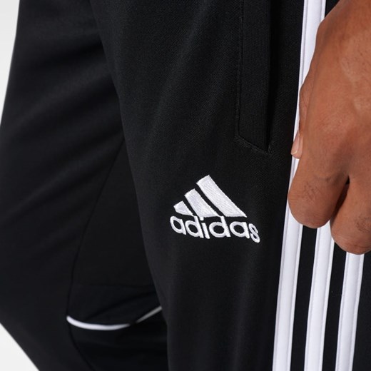 Spodnie sportowe Adidas w paski 