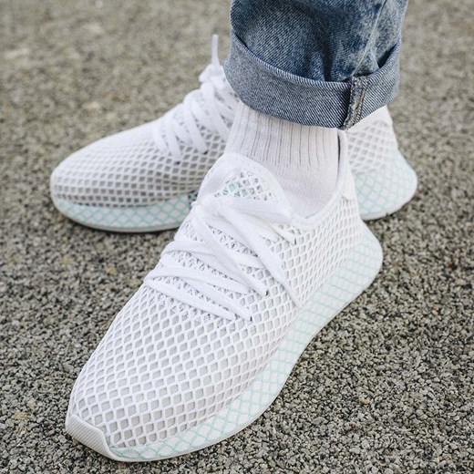 Buty sportowe damskie Adidas dla biegaczy sznurowane na płaskiej podeszwie białe 