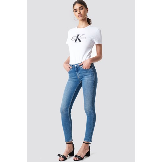 Calvin Klein Jeansy Mid Rise Skinny West - Blue Calvin Klein  26/30 NA-KD