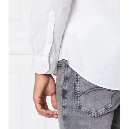 Koszula męska Tommy Jeans na wiosnę biała z kołnierzykiem button down z długim rękawem 