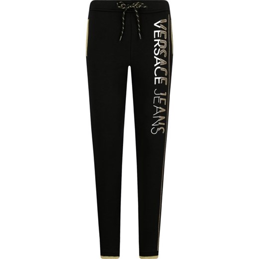 Spodnie damskie czarne Versace Jeans dresowe na jesień z napisem 
