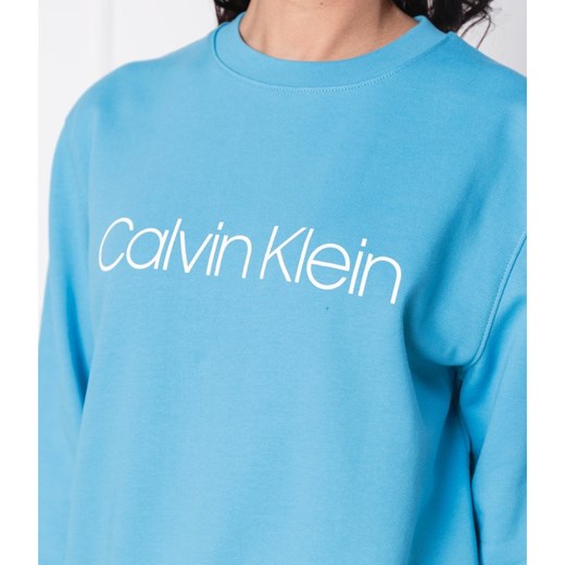 Bluza damska Calvin Klein niebieska krótka z napisami 