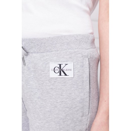 Calvin Klein Jeans Spodnie dresowe MONOGRAM | Regular Fit