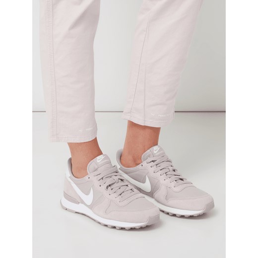 Buty sportowe damskie Nike sneakersy młodzieżowe ze skóry gładkie na płaskiej podeszwie sznurowane 