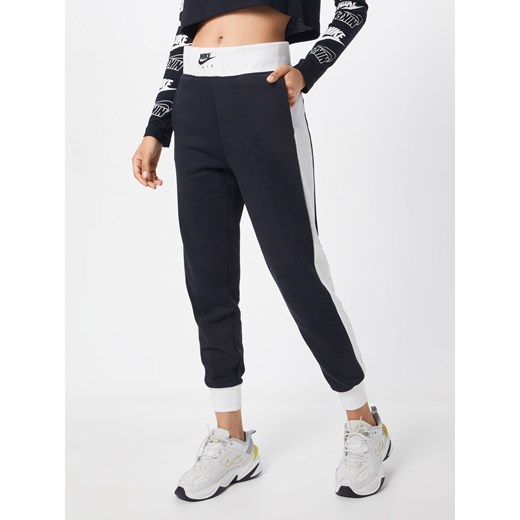 Spodnie sportowe granatowe Nike Sportswear jesienne 