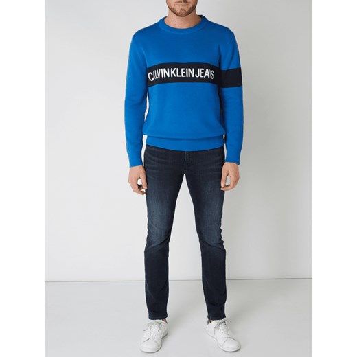 Bluza męska Calvin Klein młodzieżowa bawełniana niebieska z napisem 