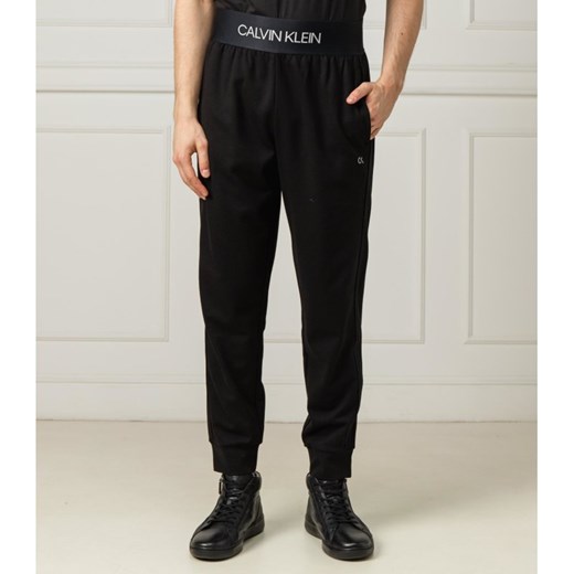 Spodnie męskie czarne Calvin Klein z napisami 