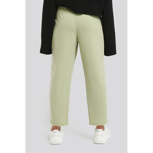 Spodnie damskie zielone NA-KD Basic 