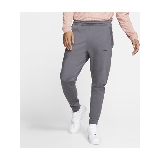 Męskie spodnie z dzianiny Nike Sportswear Tech Pack - Szary
