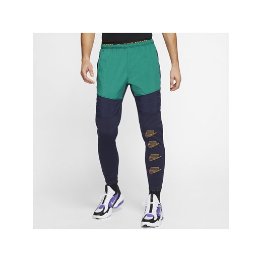 Męskie spodnie treningowe Nike Therma - Niebieski