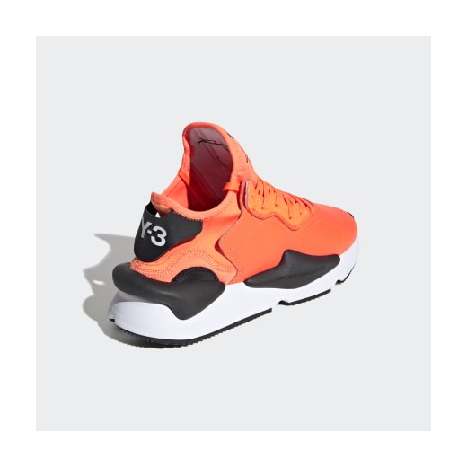 Pomarańczowe buty sportowe męskie Adidas sznurowane 