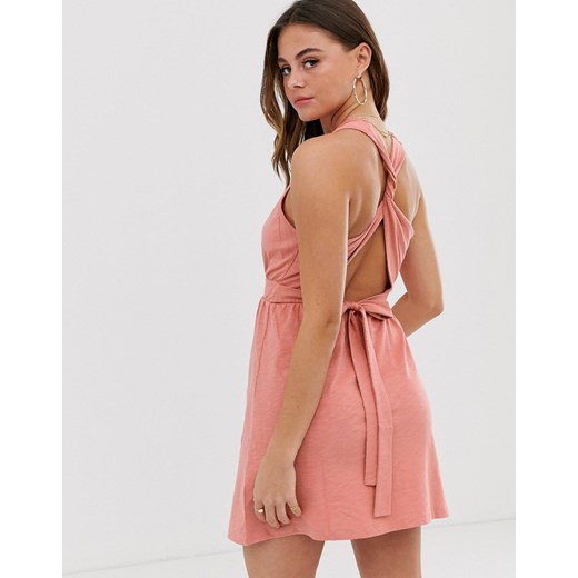 ASOS DESIGN - Letnia sukienka mini wiązana z tyłu-Różowy Poland Odzież Damska DN różowy XDLR ASOS DESIGN - Letnia sukienka mini wiązana z tyłu-Różowy Poland Odzież Damska DN różowy XDLR