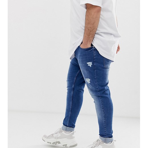 ASOS DESIGN Plus – Niebieskie jeansy typu spray on z power stretchem, z przetarciami