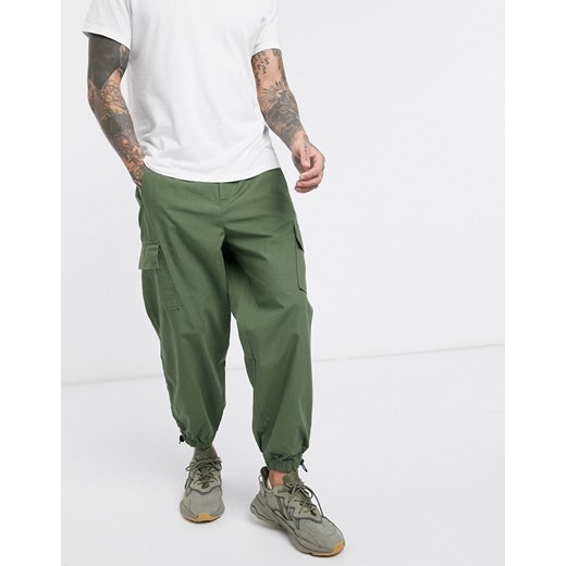 ASOS DESIGN – Zwężane spodnie oversize khaki z troczkami-Zielony