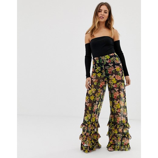 ASOS DESIGN – Szerokie spodnie z kwiatowym nadrukiem i falbankami u dołu nogawek-Wielokolorowy