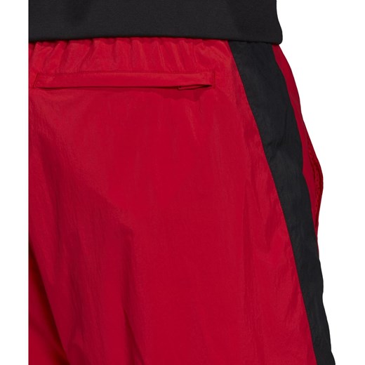Czerwone spodnie męskie Adidas w sportowym stylu 