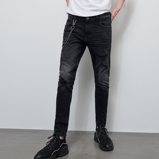 Reserved - Spodnie jeansowe z brelokiem - Czarny Reserved  33 