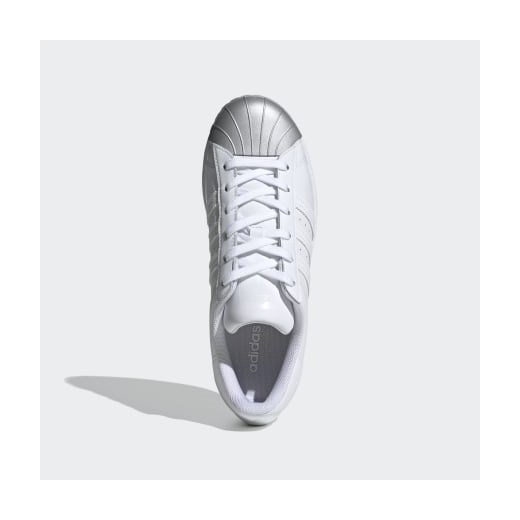 Buty sportowe damskie białe Adidas sznurowane wiosenne bez wzorów 