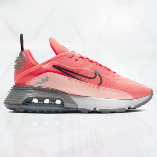 Buty sportowe damskie Nike różowe bez wzorów na wiosnę na płaskiej podeszwie sznurowane 