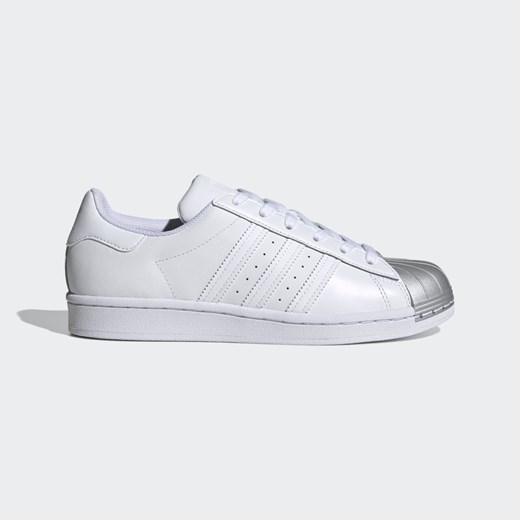 Buty sportowe damskie białe Adidas skórzane płaskie bez wzorów 