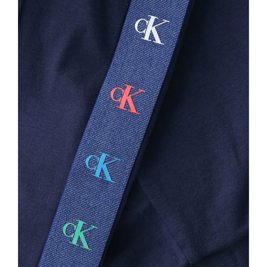Niebieskie spodnie dziewczęce Calvin Klein 