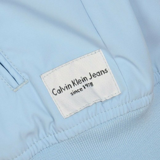 KURTKA DAMSKA CALVIN KLEIN BŁĘKITNA BOMBERKA Calvin Klein wyprzedaż Royal Shop