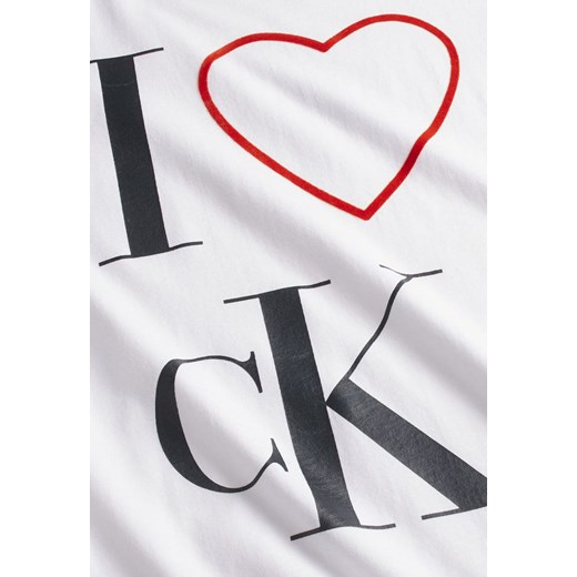 Bluzka damska Calvin Klein z napisami z bawełny z okrągłym dekoltem 