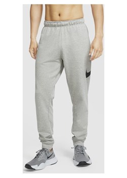 Męskie spodnie treningowe o zwężanym kroju Nike Dri-FIT - Szary ze sklepu Nike poland w kategorii Spodnie męskie - zdjęcie 126288711