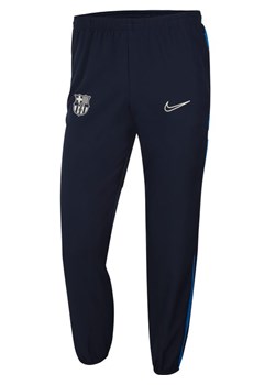 Męskie spodnie piłkarskie z tkaniny Nike Dri-FIT FC Barcelona Academy - Niebieski ze sklepu Nike poland w kategorii Spodnie męskie - zdjęcie 126291150
