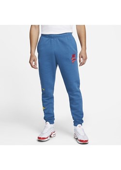 Męskie spodnie z dzianiny Nike Sportswear Sport Essentials+ - Niebieski ze sklepu Nike poland w kategorii Spodnie męskie - zdjęcie 127451293