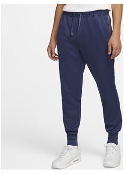 Męskie spodnie piłkarskie Nike F.C. - Niebieski ze sklepu Nike poland w kategorii Spodnie męskie - zdjęcie 127544663