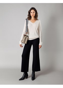 Czarne dzianinowe spodnie z lekko rozszerzaną nogawką ze sklepu Molton w kategorii Spodnie damskie - zdjęcie 130217263