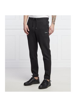 Calvin Klein Spodnie dresowe | Regular Fit | regular waist ze sklepu Gomez Fashion Store w kategorii Spodnie męskie - zdjęcie 132124474