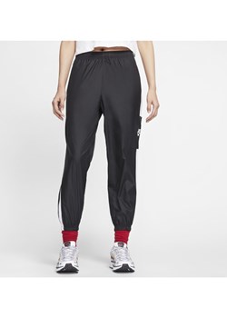 Damskie spodnie z tkaniny Nike Sportswear - Czerń ze sklepu Nike poland w kategorii Spodnie damskie - zdjęcie 133269731