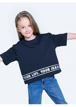 Koszulka dziewczęca z błyszczącym nadrukiem Hildori 403 ze sklepu Big Star w kategorii Bluzki dziewczęce - zdjęcie 133511274