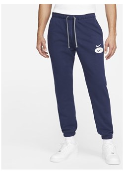 Męskie joggery z dzianiny dresowej Nike Sportswear Swoosh League - Niebieski ze sklepu Nike poland w kategorii Spodnie męskie - zdjęcie 133528784