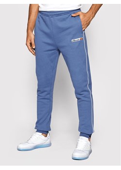Ellesse Spodnie dresowe Laci SHK12191 Niebieski Regular Fit ze sklepu MODIVO w kategorii Spodnie męskie - zdjęcie 134249660